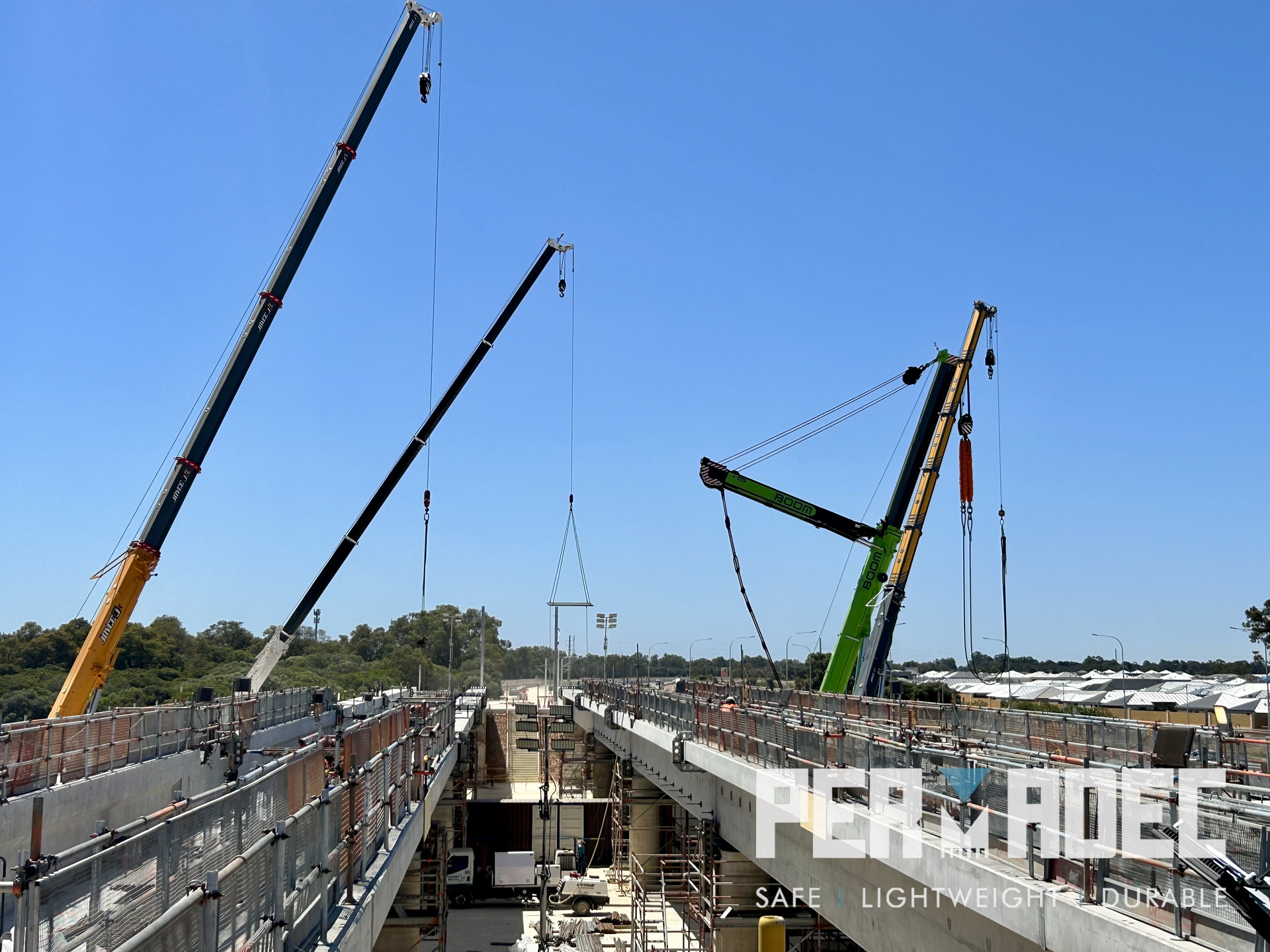 Permadec permanent formwork being installed at Whiteman Park in Western Australia, part of the METRONET project. Cranes lifting GRP panels into place over precast infrastructure.